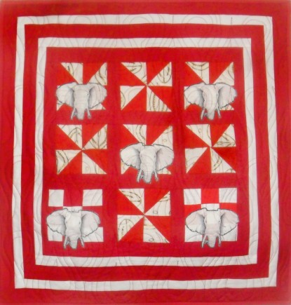 Small Giants, Quilt by Aisha Lumumba, www.obaquilts.com